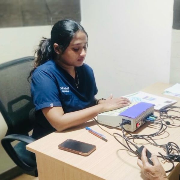 2 Hearing test in Nagasandra Bangalore – Audiologist conducting a professional hearing assessment.